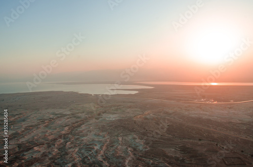 The sun rises over the dead sea, Israel © shaycobs