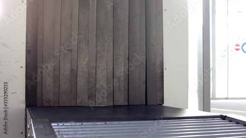 Empty baggage tape. Checking at the entrance to airport. Primary control of baggage in airports with baggage tape and X-ray machine. Preflight inspection of baggage and hand luggage. Security check