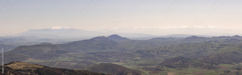 Panoramic view from Ruy summit, located on border between Serbia and Bulgaria, on snow covered mountains Rila and Vitosha Panoramic view from Ruy summit, located on border between Serbia and Bulgaria, on snow covered mountains Rila and Vitosha