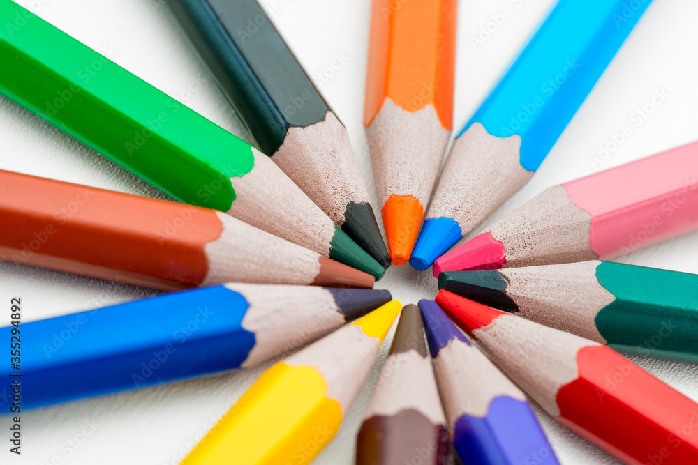 circular layout of colored pencils on a white background is isolated circular layout of colored pencils on a white background is isolated