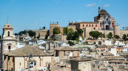 View from one of its narrow and ancient and medieval streets of the Vera Cruz Monastery in the town of Caravaca de la Cruz, Murcia, with the population at its feet.