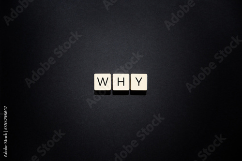 Letters why on black background
