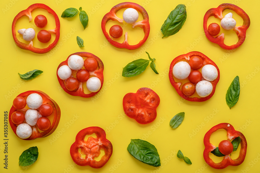 red pepper, basil, mushrooms on yellow red pepper, basil, mushrooms on yellow