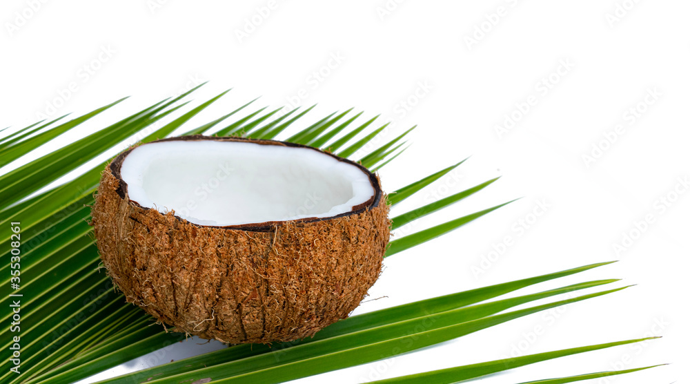 The coconuts are peeled and cut. Asian cooking is on a completely separate white ground. The coconuts are peeled and cut. Asian cooking is on a completely separate white ground.
