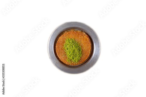Photography Traditional dessert kunefe over white background, top view, copy space
