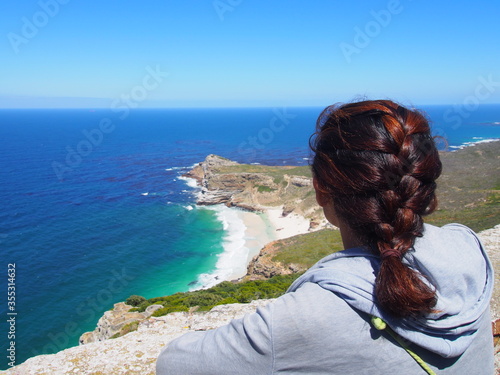 Woman looking at the beautiful sea, Cape of Good Hope, Cape Town, South Africa