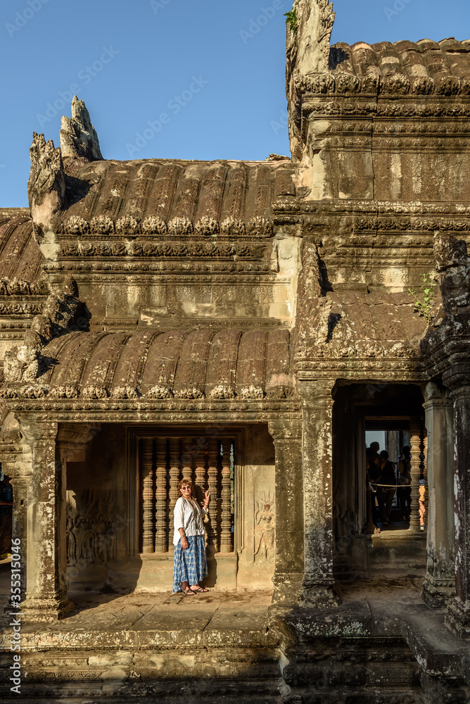 Caucasian Woman Posing at the Angkor Wat Temple in Siem Reap Cambodia