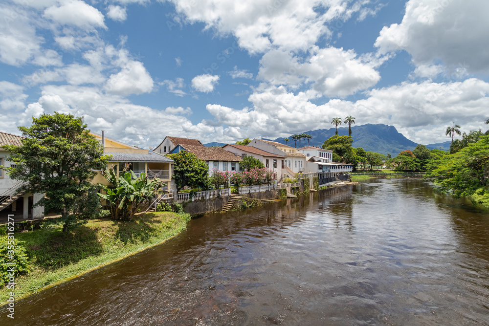 Fototapeta premium Landscape of the small town of Morretes, in the interior of Paraná, in the southern region of Brazil, with exuberant nature and houses by the river.