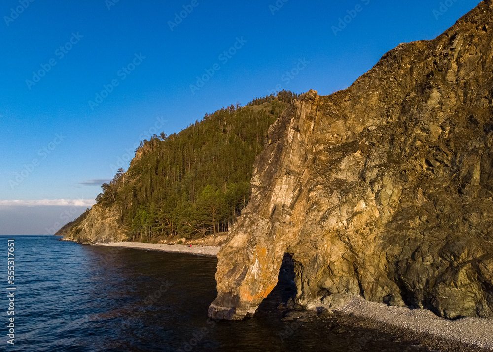 Stone arch on the shore of Lake Baikal, aerial view