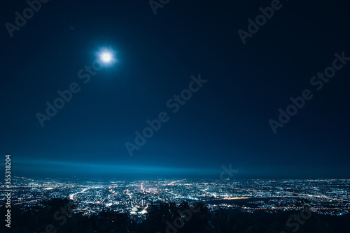 Chiang Mai city view at night with full moon © JX