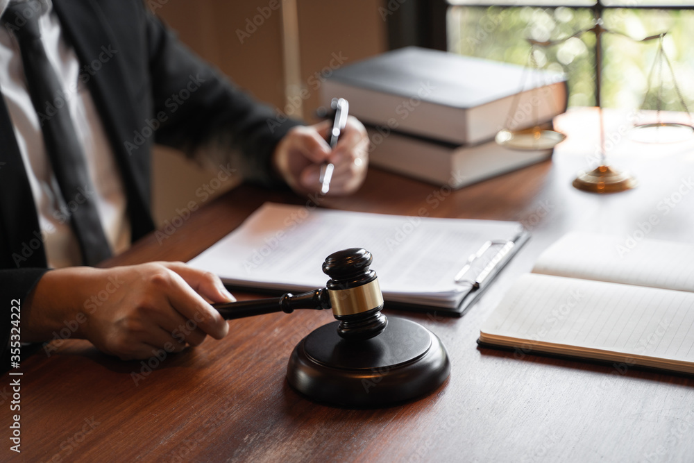 lawyer consulting with client discussing about contract. lawyer consulting with client discussing about contract.