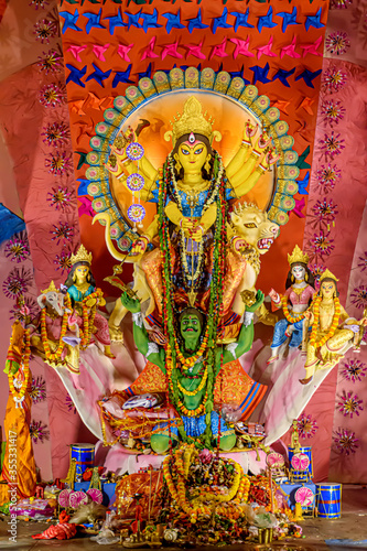 Idol of Goddess Devi Durga at a decorated puja pandal in Kolkata, West Bengal, India. Durga Puja is a famous and major religious festival of Hinduism that is celebrated throughout the world. © Sudip Biswas