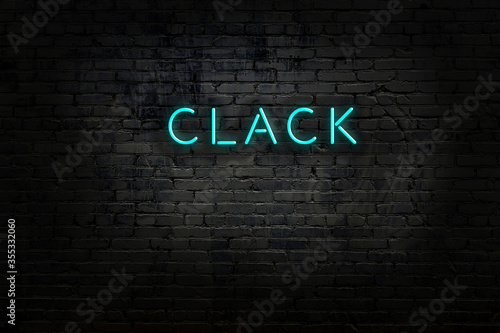 фотографія Neon sign with inscription clack against brick wall