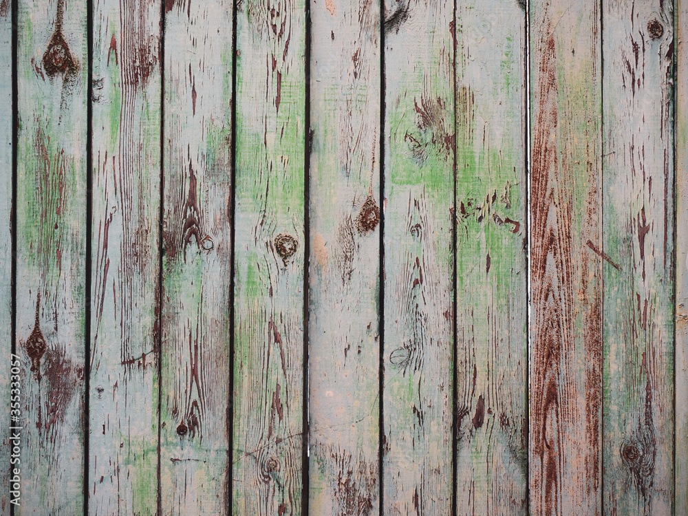Old wooden fence with cracked paint texture Old wooden fence with cracked paint texture