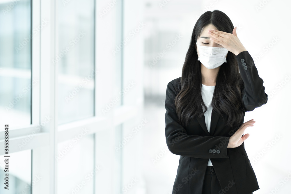 A business lady wearing a mask