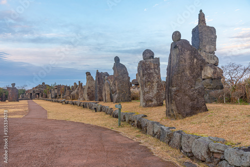 Dongjasok - stone guardians at Jeju stone park, republic of Korea photo