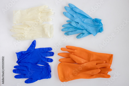 colorful gloves orange gloves blue gloves blue gloves white gloves © workphoto