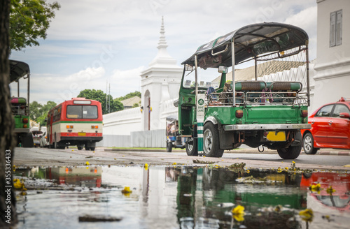 Photography Tuk Tuk taxi waiting customers about Wat Phra Kaeo Bangkok