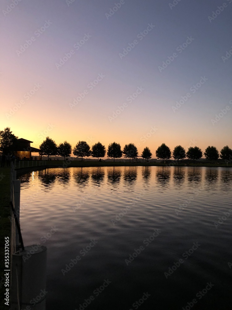 Obraz premium sunset over the river