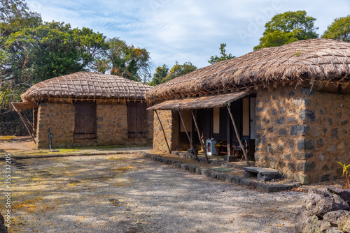 Traditional houses at Seongeup folk village at Jeju island, Republic of Korea photo