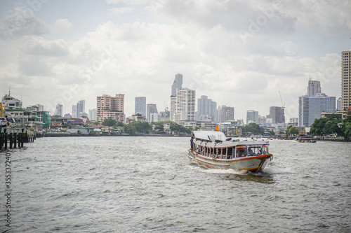 the Tourism and travel in Bangkok by the Chao Phraya Express Boat.
