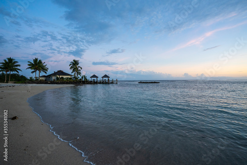 Fototapeta Naklejka Na Ścianę i Meble -  Sunset on a beach in tropical Samoa