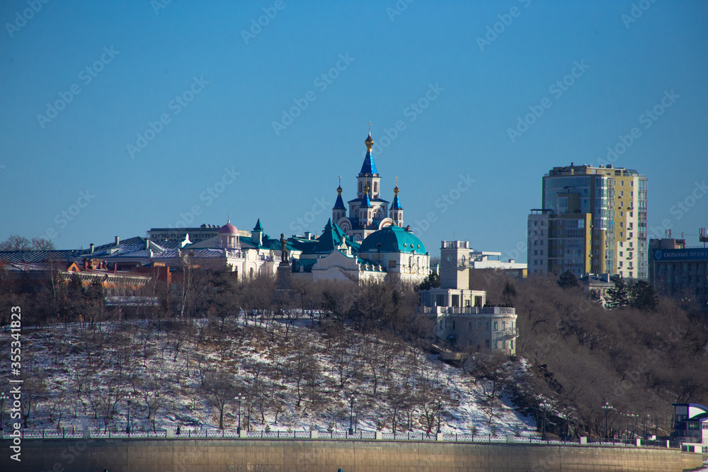view of the temples of Khabarovsk, across the Amur river