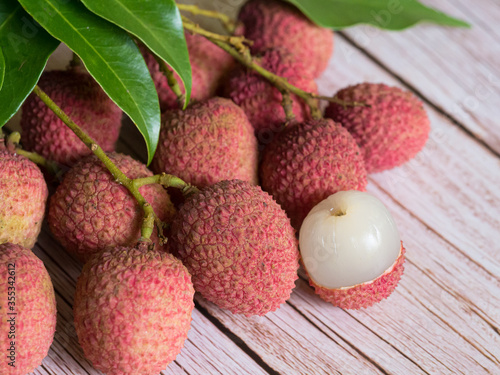 close-up of Lychee peel, placed on a wooden table.