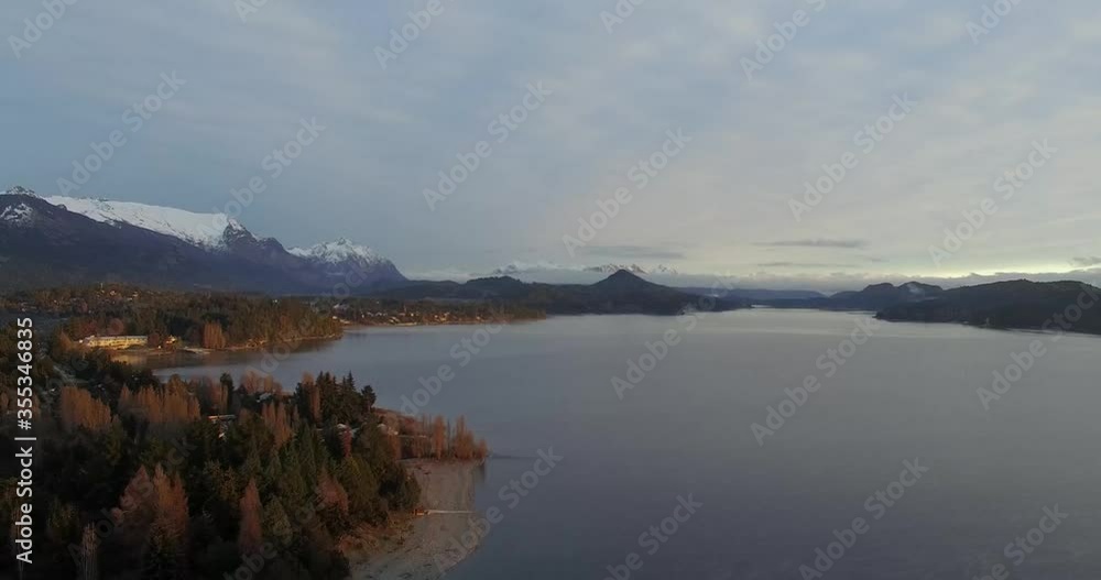 Air view of the mountains with snow and the lake Nahuel Huapi in Bariloche Patagonia on an autumn day. Air view of the mountains with snow and the lake Nahuel Huapi in Bariloche Patagonia on an autumn day.
