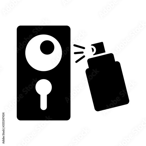 disinfected surface of door handle with spray bottle silhouette style