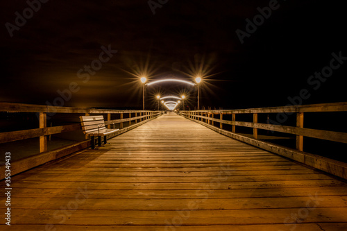 pier at night long exposure in white rock, canada