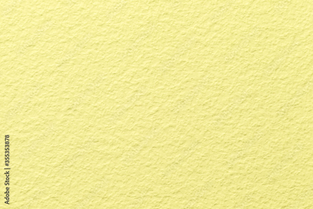 Texture of Light yellow old decorative plaster material with pattern, macro background. Texture of Light yellow old decorative plaster material with pattern, macro background.