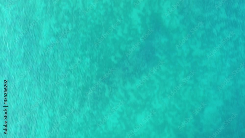 Flying drone looking from above over crystal clear turquoise water at Lake Konstanz in Germany Flying drone looking from above over crystal clear turquoise water at Lake Konstanz in Germany