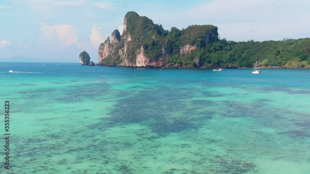 Aerial view to Lo Dalum beach with boats in a sunny day