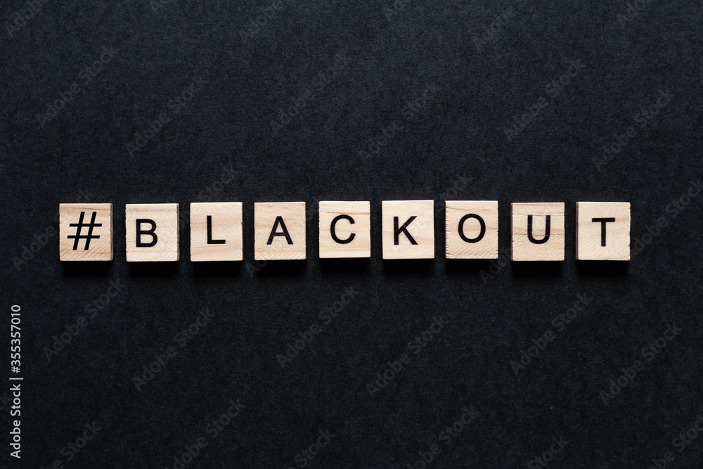 Obraz premium Blackout inscription on a black background. Black lives matter, blackout tuesday 2020 concept. blackout in USA. unrest. protests.