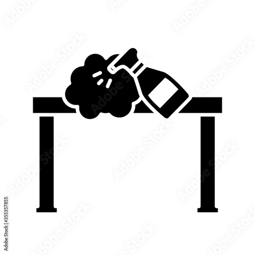 disinfected surface of table with spray bottle silhouette style