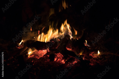 orange flame, smoldering logs, fire magic