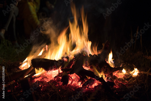 orange flame, smoldering logs, fire magic