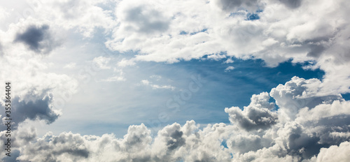 Background with white clouds against the sky