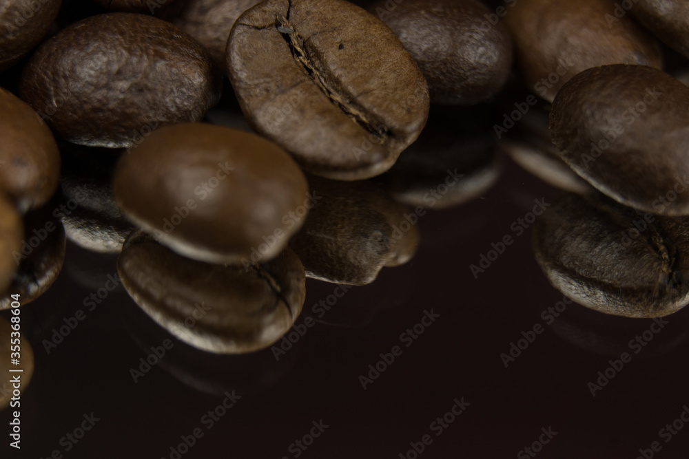Fragrant fried coffee beans. close-up texture Fragrant fried coffee beans. close-up texture
