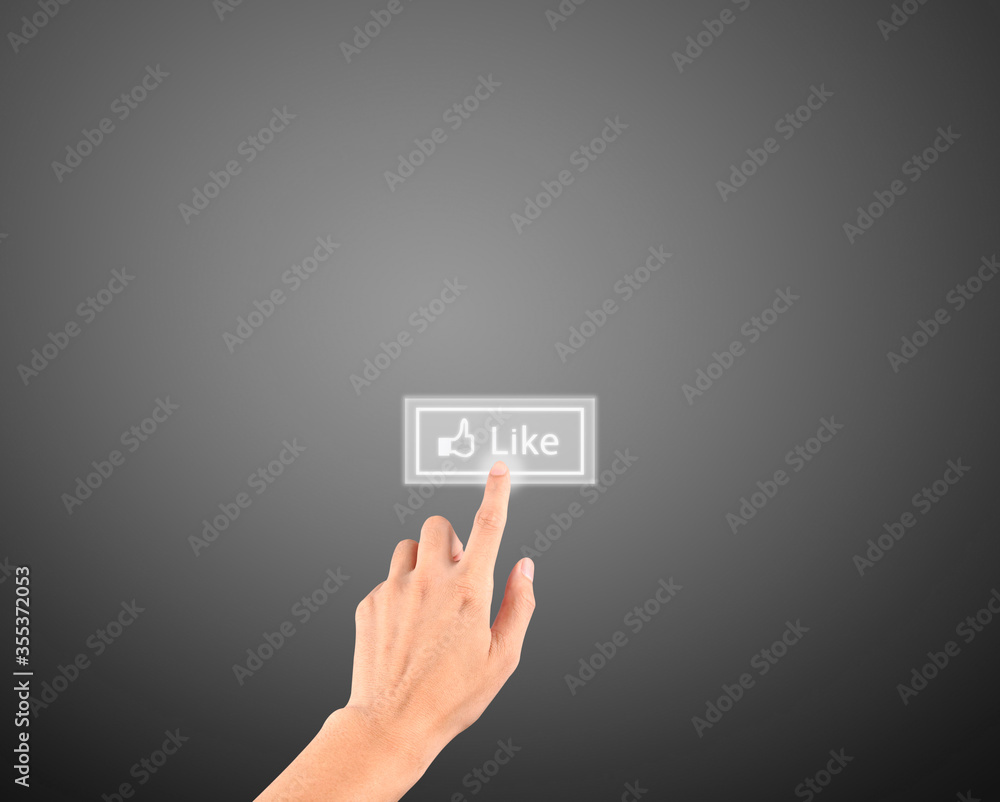hand pushing like button on a touch screen interface hand pushing like button on a touch screen interface