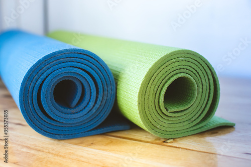 Yoga mats, two rolls, blue-green