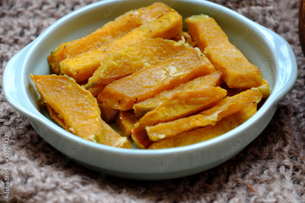 healthy food for vegetarian, sliced of baked yellow squash, nutrition for vegan meal or non meat diet healthy food for vegetarian, sliced of baked yellow squash, nutrition for vegan meal or non meat diet