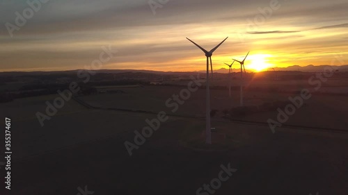 Wind Turbine at sunset, shoot by a Drone