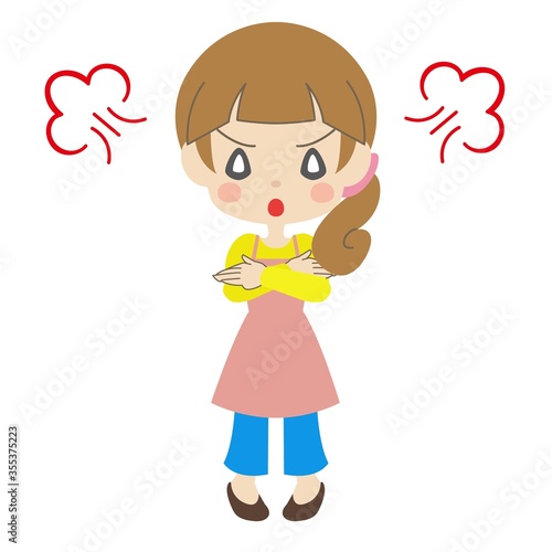 腕を組んで怒るエプロンを着た女性