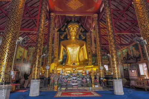 view of golden giant buddha statue in buddhist temple, Wat Jed Yot, Chiang Rai City, northern of Thailand.