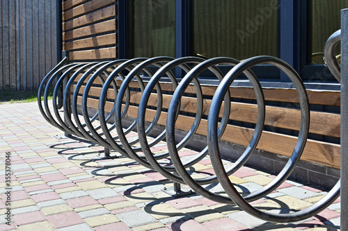 Bicycle metal parking near store.