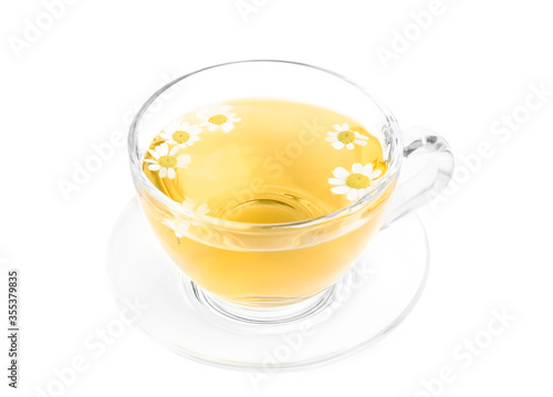 Delicious chamomile tea in glass cup isolated on white
