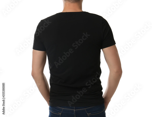 Man in black t-shirt on white background, closeup. Space for design