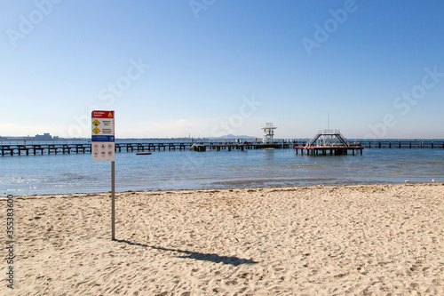 Eastern Beach Swimming Enclosure on Corio Bay opened in the 1930's is a protected seawater swimming pool with lifeguards, children's area and a shark gate. photo